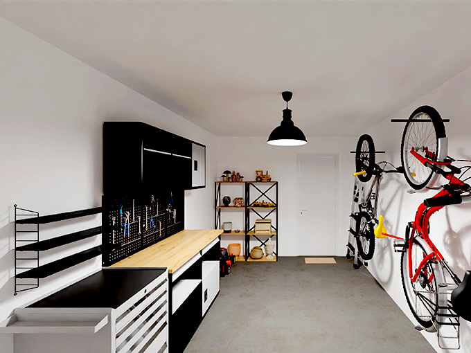 Garage avec établi de bricoleur et vélos